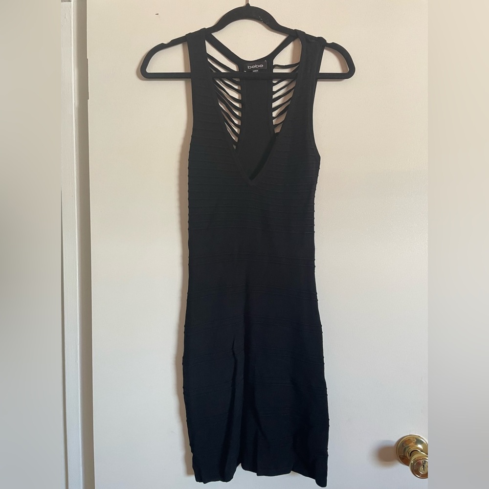 Bebe Black Knit stretch Cutout Mini Dress. Size S